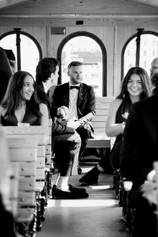 Black and white portrait of the couple inside the trolley