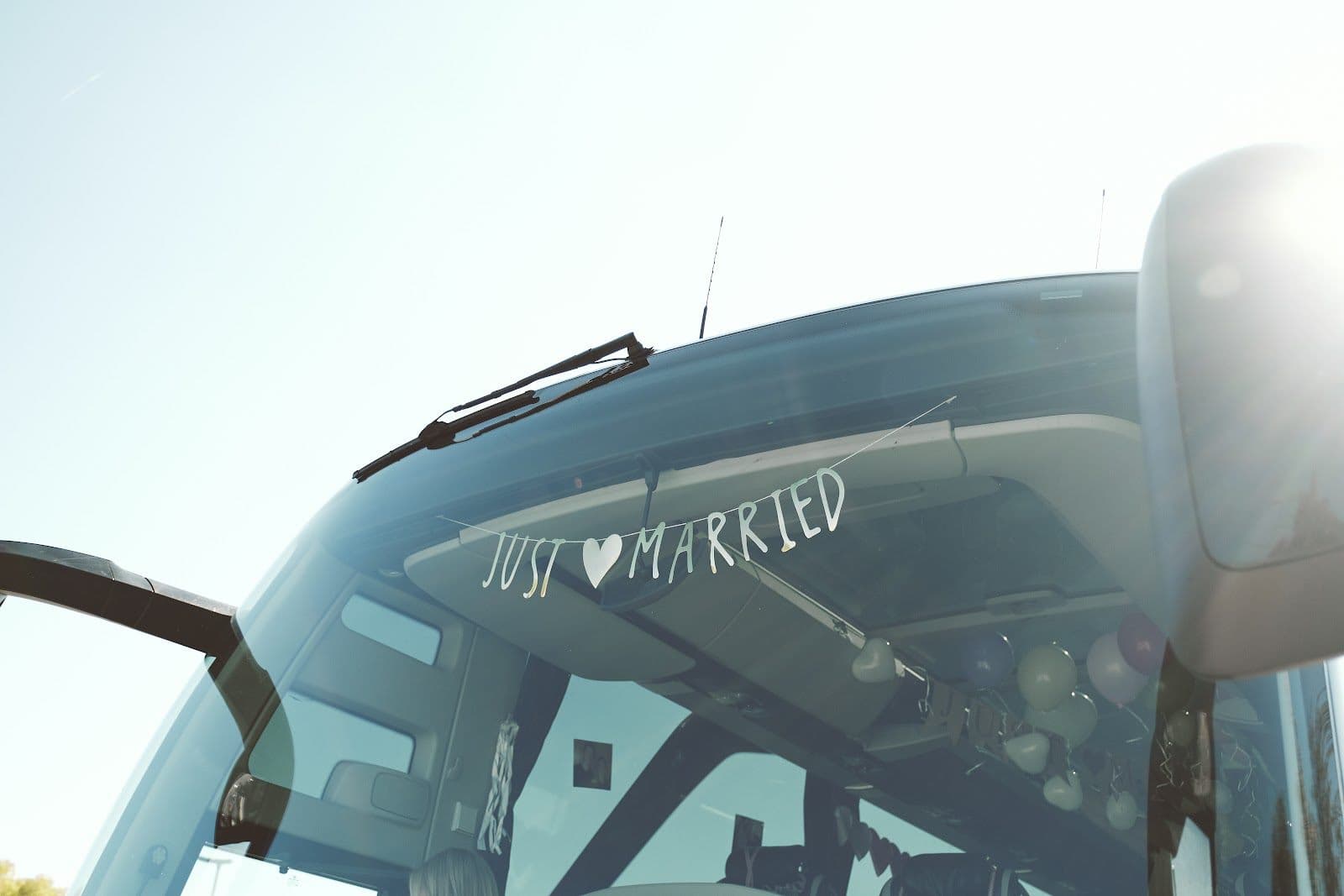 "Just Married" written across a Golden vehicle